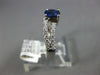 .97CT DIAMOND & AAA SAPPHIRE 18KT WHITE GOLD OVAL & ROUND SWIRL ENGAGEMENT RING