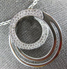 ESTATE LARGE .37CT DIAMOND 18KT WHITE GOLD OVAL LOVE KNOT CIRCLE OF LIFE PENDANT