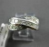 ESTATE WIDE .65CT ROUND & PRINCESS CUT DIAMOND 14KT WHITE GOLD X COCKTAIL RING