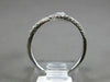 ESTATE .27CT DIAMOND & AAA RUBY 18KT WHITE GOLD 3D CRISS CROSS SNAKE FUN RING
