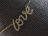 ESTATE .16CT DIAMOND 14KT YELLOW GOLD 3D CLASSIC ROUND LOVE SCRIPT FUN NECKLACE