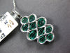 LARGE 2.12CT DIAMOND & AAA EMERALD 18KT WHITE GOLD OVAL INFINITY JOURNEY PENDANT
