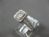 ESTATE .79CT DIAMOND 18KT WHITE GOLD ROUND & BAGUETTE CLUSTER SQUARE LOVE RING