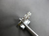 .64CT DIAMOND 18KT WHITE GOLD ROUND 3 STONE PAST PRESENT FUTURE ENGAGEMENT RING