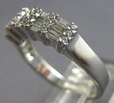 .73CT DIAMOND 18KT WHITE GOLD 3D ROUND & BAGUETTE CHANNEL PRONG MULTI ROW RING
