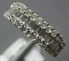 1.13CT DIAMOND 18KT WHITE GOLD 3D ROUND & BAGUETTE SEMI HEXAGON ANNIVERSARY RING