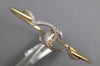 ESTATE .26CT DIAMOND 14KT YELLOW GOLD 3D DOUBLE HEART LOVE KNOT BANGLE BRACELET