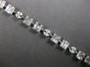 4.22CT DIAMOND 18KT WHITE GOLD ROUND BAGUETTE & MARQUISE SQUARE TENNIS BRACELET