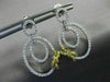 .85CT WHITE & FANCY YELLOW DIAMOND 18KT TWO TONE GOLD OVAL BOW HANGING EARRINGS