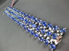LARGE 79.21CT DIAMOND & CABOCHON TANZANITE 18KT WHITE GOLD OVAL TENNIS BRACELET