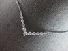 .59CT DIAMOND 14KT WHITE GOLD 3D GRADUATING V SHAPE SHARED PRONG LOVE NECKLACE