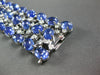 LARGE 79.21CT DIAMOND & CABOCHON TANZANITE 18KT WHITE GOLD OVAL TENNIS BRACELET
