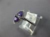 .70CT DIAMOND & AAA AMETHYST 14KT WHITE GOLD TRILLION & ROUND CRISS CROSS RING