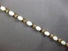 4.6CT DIAMOND & AAA OPAL 14KT YELLOW GOLD OVAL & ROUND ETERNITY BRACELET 28192