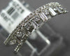 ESTATE .42CT DIAMOND 18KT WHITE GOLD 3D ROUND & BAGUETTE CRISS CROSS FUN RING