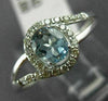 ESTATE .48CT DIAMOND & AAA OVAL CUT AQUAMARINE 14KT WHITE GOLD 3D LOVE KNOT RING