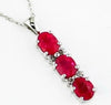ESTATE 1.25CT DIAMOND & AAA RUBY 14KT WHITE GOLD OVAL & ROUND FLOATING PENDANT