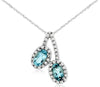 ESTATE .55CT DIAMOND & AAA AQUAMARINE 14KT WHITE GOLD OVAL & ROUND LOVE PENDANT