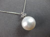 .06CT DIAMOND & AAA SOUTH SEA PEARL 14KT WHITE GOLD FLOWER TRILLION FUN PENDANT