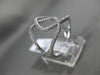 ESTATE WIDE .36CT DIAMOND 18KT WHITE GOLD OPEN DOUBLE INFINITY HOOP X LOVE RING