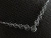 ESTATE .60CT DIAMOND 18KT WHITE GOLD 3D ROUND SHARED PRONG V SHAPE LOVE NECKLACE