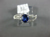 .97CT DIAMOND & AAA SAPPHIRE 18KT WHITE GOLD OVAL & ROUND SWIRL ENGAGEMENT RING