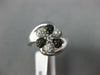ESTATE .25CT WHITE & BLACK DIAMOND 14KT WHITE GOLD FLOWER CRISS CROSS FUN RING