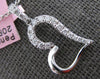 ESTATE .24CT DIAMOND 14KT WHITE GOLD CLASSIC ROUND OPEN HEART FLOATING PENDANT