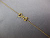 ESTATE .12CT FANCY YELLOW DIAMOND 18KT YELLOW GOLD 3D DOG BONE FUN BRACELET