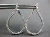 ESTATE LARGE 1.25CT DIAMOND 18KT WHITE GOLD TEAR DROP SIDEWAYS HANGING EARRINGS