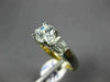 ESTATE .42CT BAGUETTE & ROUND DIAMOND & CUBIC ZIRCONIUM PLATINUM ENGAGEMENT RING