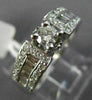 ESTATE .90CT ROUND & BAGUETTE DIAMOND 14KT WHITE GOLD FOUR PRONG ENGAGEMENT RING