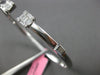 WIDE .72CT DIAMOND 18KT WHITE GOLD 3D ROUND & BAGUETTE FLEXIBLE BANGLE BRACELET