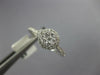 ESTATE .31CT DIAMOND 18KT WHITE GOLD 3D CLUSTER FLOWER HALO FRIENDSHIP RING