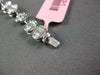 3.98CT DIAMOND 18KT WHITE GOLD INVISIBLE FLOWER OVAL BY THE YARD TENNIS BRACELET