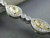 ESTATE LONG 6.23CT WHITE & FANCY YELLOW DIAMOND 18KT WHITE GOLD TENNIS BRACELET