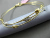 ESTATE .42CT DIAMOND 14KT TWO TONE GOLD HAMMERED BY THE YARD BANGLE BRACELET