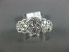 ESTATE 1.07CT DIAMOND 18KT WHITE GOLD MULTI FLOWER HALO CLASSIC ANNIVERSARY RING