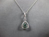 .50CT DIAMOND & AAA EMERALD 18KT WHITE GOLD 3D TRILLION & ROUND FLOATING PENDANT