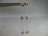 .15CT DIAMOND 14KT WHITE GOLD MARQUISE SHAPE HEART BY THE YARD HANGING EARRINGS