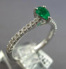 .46CT DIAMOND & AAA EMERALD 18KT WHITE GOLD PEAR SHAPE & ROUND FRIENDSHIP RING