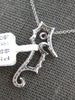 ESTATE .33CT DIAMOND & AAA RUBY 14KT WHITE GOLD HAPPY SEAHORSE FLOATING PENDANT