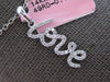 ESTATE .16CT DIAMOND 14KT WHITE GOLD 3D SCRIPT LOVE FLOATING PENDANT
