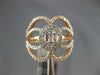 WIDE .97CT DIAMOND 14KT ROSE GOLD 3D ROUND & BAGUETTE INVISIBLE OVAL FLOWER RING