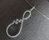 ESTATE LARGE .42CT DIAMOND 14KT WHITE GOLD 3D INFINITY FLOWER FLOATING PENDANT