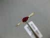 .34CT ROUND DIAMOND & AAA PEAR SHAPE RUBY 14KT ROSE GOLD FRIENDSHIP PROMISE RING