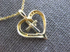 ESTATE .05CT DIAMOND 14KT YELLOW GOLD 3D CLASSIC CROSS HEART FLOATING PENDANT