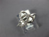ESTATE .13CT DIAMOND 18KT WHITE GOLD 3D CLASSIC LOVE KNOT FLOWER STAR RING