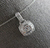 ESTATE .29CT DIAMOND 14KT WHITE GOLD 3D CLASSIC ROUND SQUARE FOATING PENDANT