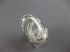 ESTATE EXTRA LARGE 1.56CT DIAMOND 14K WHITE GOLD ROUND & BAGUETTE LOVE KNOT RING